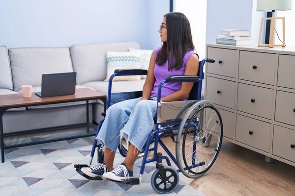 Young Hispanic Woman Sitting Wheelchair Home Looking Side Relax Profile — Foto Stock