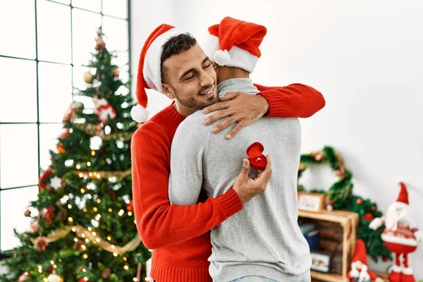 Two Hispanic Men Couple Surprise Engagement Ring Standing Christmas Tree — Stock Photo, Image