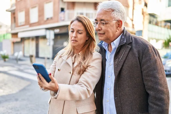 Middle Age Man Woman Couple Smiling Confident Using Smartphone Street — Fotografia de Stock