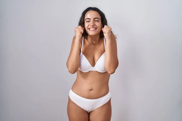 Young Hispanic Woman Wearing White Lingerie Excited Success Arms Raised — 图库照片