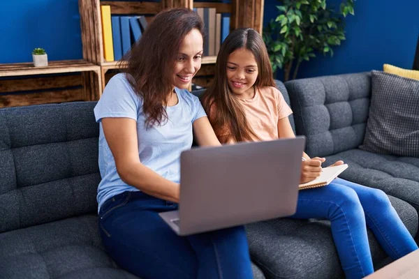 Woman Girl Mother Daughter Using Laptop Write Notebook Home — Stockfoto