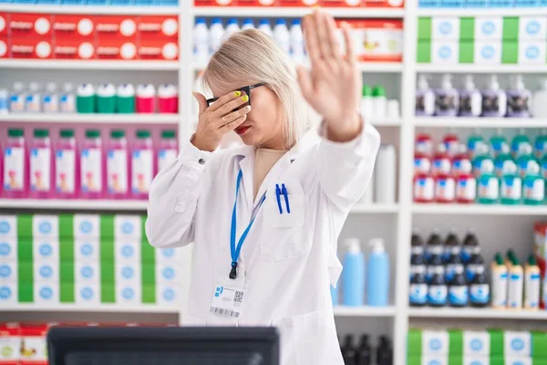 Young Caucasian Woman Working Pharmacy Drugstore Covering Eyes Hands Doing — Fotografia de Stock
