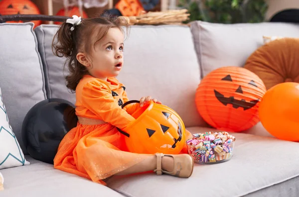 Adorable Hispanic Toddler Having Halloween Party Holding Sweets Home — Stok fotoğraf