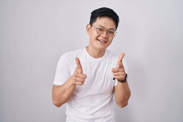Young Asian Man Standing White Background Pointing Fingers Camera Happy — Foto de Stock