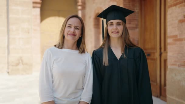 Two Women Mother Graduated Daughter Standing Arms Crossed Gesture Campus — Stockvideo