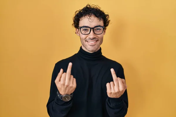 Hispanic Man Standing Yellow Background Showing Middle Finger Doing Fuck — Foto Stock