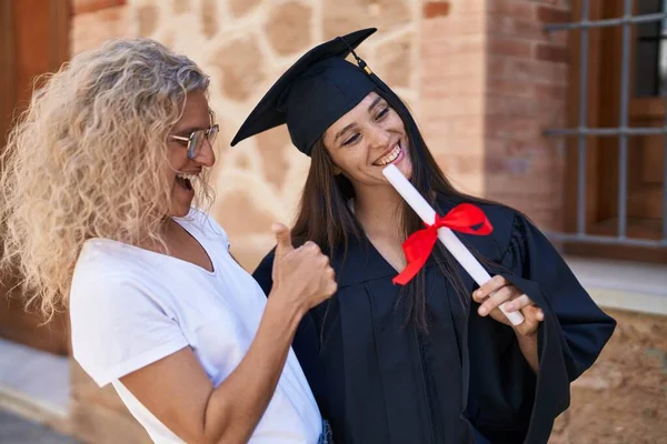Two Women Mother Graduated Daughter Holding Diploma Doing Gesture Campus — ストック写真