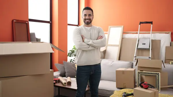 Young Hispanic Man Smiling Confident Standing Arms Crossed New Home — Stockfoto
