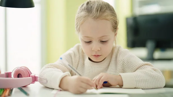 Adorable Blonde Girl Student Writing Notebook Sitting Table Classroom — Fotografia de Stock