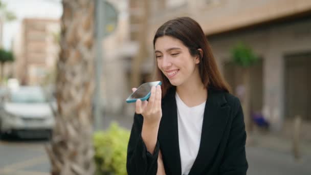 Young Hispanic Girl Smiling Confident Talking Smartphone Street — Stockvideo