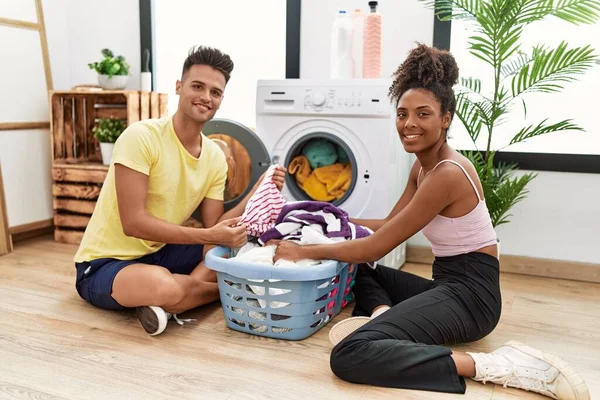 Man Woman Couple Smiling Confident Washing Clothes Laundry Room — Stockfoto