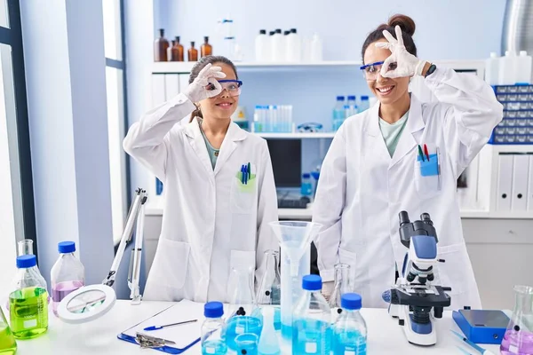 Young Mother Daughter Scientist Laboratory Smiling Happy Doing Sign Hand — Stock Photo, Image