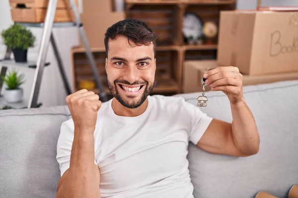 Handsome Hispanic Man Holding Keys New Home Screaming Proud Celebrating — Stockfoto