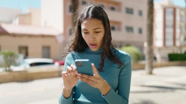 Young African American Woman Smiling Confident Using Smartphone Street — Video