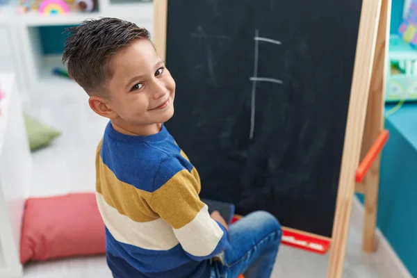 Adorable Hispanic Boy Preschool Student Drawing Blackboard Kindergarten — Fotografia de Stock