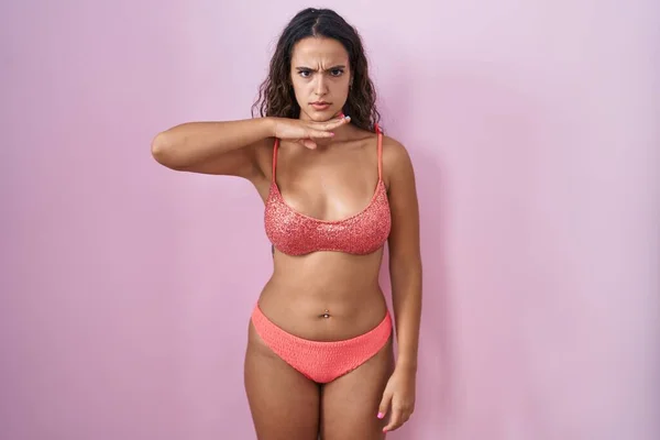 Young Hispanic Woman Wearing Lingerie Pink Background Cutting Throat Hand — 图库照片