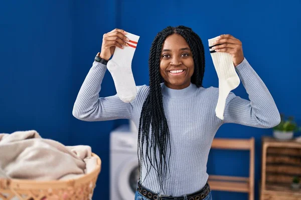 African American Woman Holding Socks Smiling Happy Cool Smile Face — ストック写真