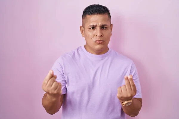 Young Hispanic Man Standing Pink Background Doing Money Gesture Hands — Stock Photo, Image