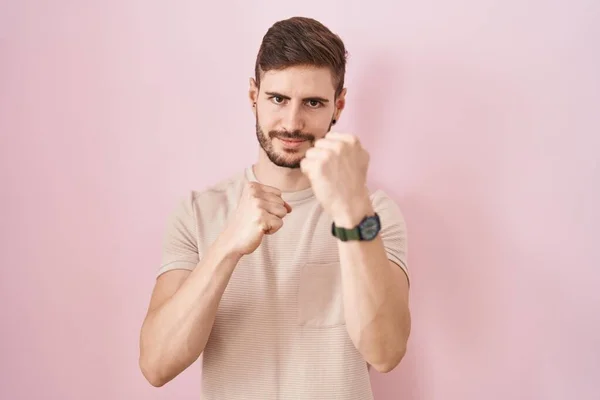 Hispanic Man Beard Standing Pink Background Ready Fight Fist Defense — Stockfoto