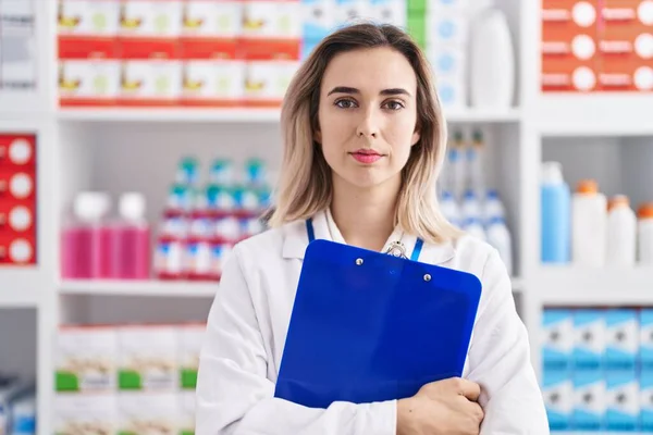 Young Woman Pharmacist Holding Checklist Pharmacy —  Fotos de Stock