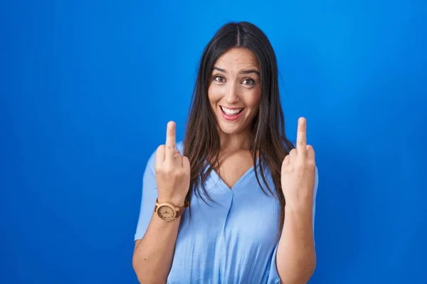Young Brunette Woman Standing Blue Background Showing Middle Finger Doing — Stockfoto