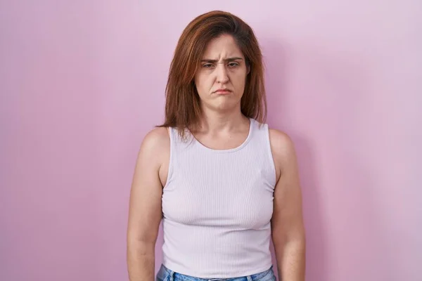 Brunette Woman Standing Pink Background Skeptic Nervous Frowning Upset Because — Stock Photo, Image