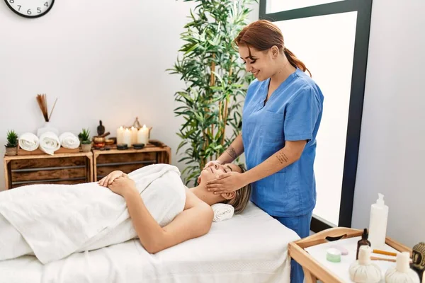 Woman Couple Smiling Confident Having Facial Massage Beauty Center — 图库照片