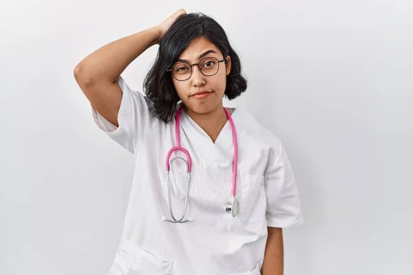 Young Hispanic Doctor Woman Wearing Stethoscope Isolated Background Confuse Wonder — Zdjęcie stockowe