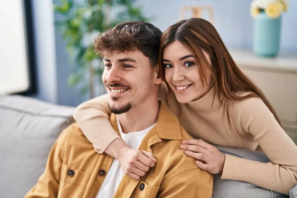 Mand Woman Couple Hugging Each Other Sitting Sofa Home — Stockfoto
