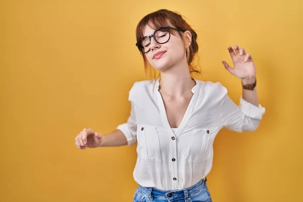 Young Beautiful Woman Wearing Casual Shirt Yellow Background Stretching Back — Stock Fotó