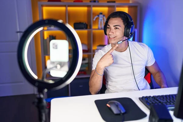 Young Hispanic Man Playing Video Games Recording Smartphone Smiling Happy — ストック写真