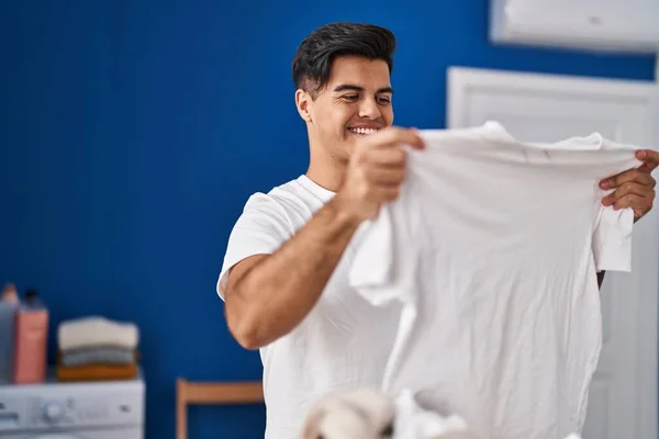 Young Hispanic Man Smiling Confident Hanging Clothes Clothesline Laundry Room — Stock Photo, Image
