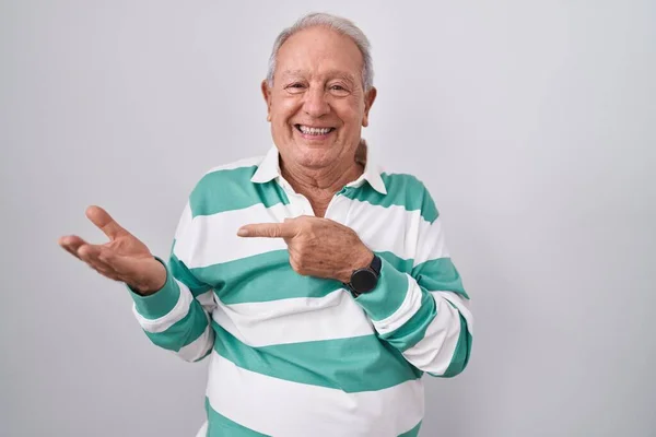 Senior Man Grey Hair Standing White Background Amazed Smiling Camera — Stockfoto