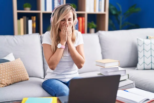Young Blonde Woman Studying Using Computer Laptop Home Laughing Embarrassed — Stockfoto