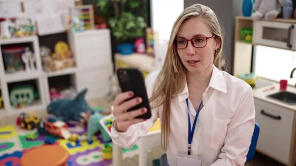 Young Blonde Woman Preschool Teacher Having Video Call Kindergarten — 图库视频影像