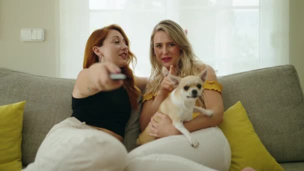 Two Women Watching Sitting Sofa Chihuahua Home — 비디오