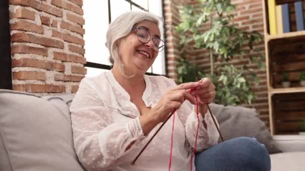Middle Age Grey Haired Woman Smiling Confident Sewing Using Wool — Stock video