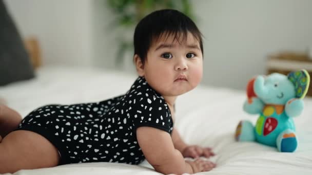 Adorable Hispanic Baby Lying Bed Bedroom — Wideo stockowe