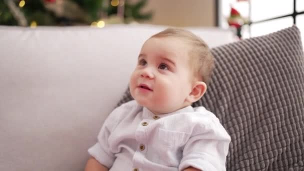 Adorable Toddler Wearing Christmas Hat Smiling Tickles Home — Vídeos de Stock