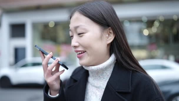 Young Chinese Woman Smiling Confident Sending Voice Message Smartphone Street — Stock Video
