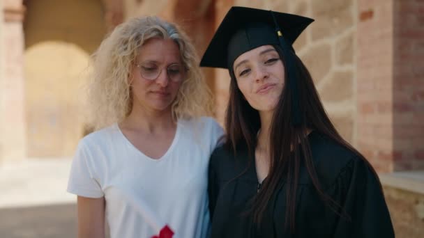 Two Women Mother Graduated Daughter Holding Diploma Doing Gesture Campus — Wideo stockowe