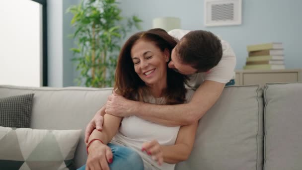 Man Woman Couple Hugging Each Other Sitting Sofa Home — Stock Video