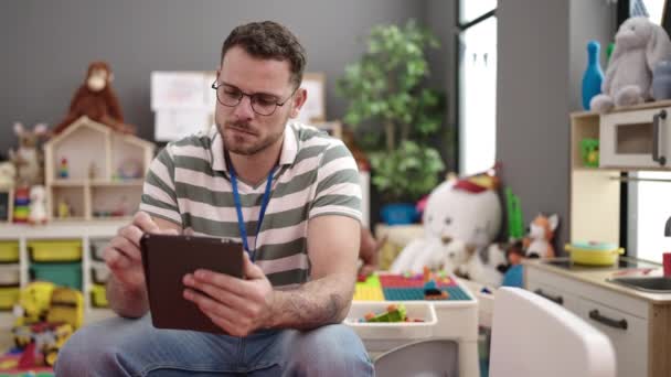 Young Caucasian Man Working Teacher Tablet Kindergarten — Vídeos de Stock