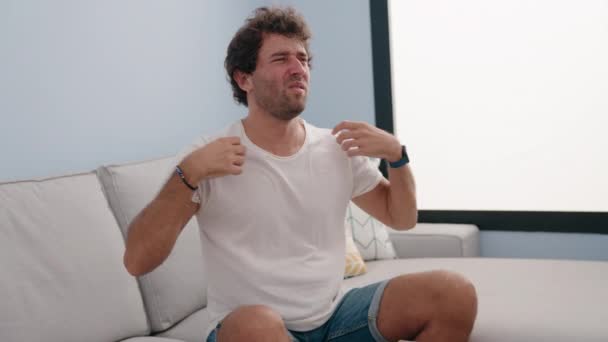 Young Hispanic Man Make Air Hand Sweating Home — Stok Video