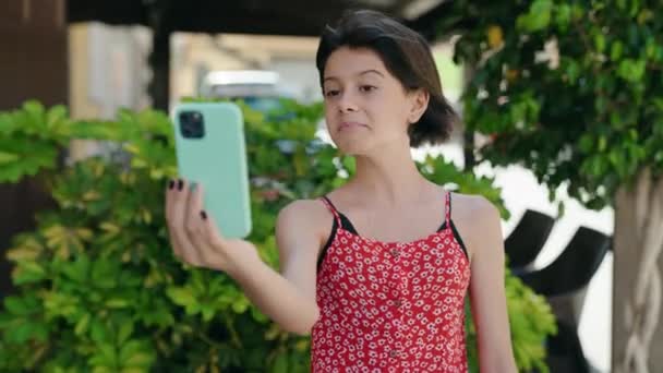 Adorable Hispanic Girl Smiling Confident Having Video Call Street — Stock video