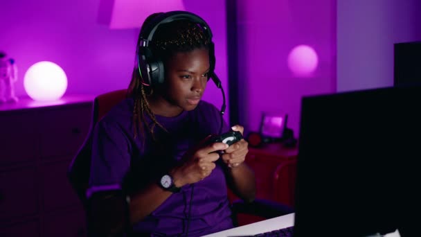 African American Woman Streamer Playing Video Game Using Joystick Gaming — Stock Video