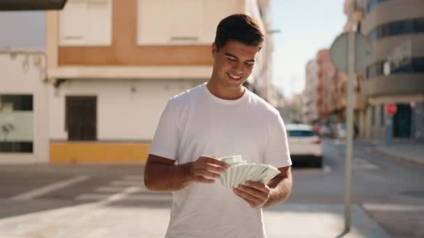 Young Hispanic Man Smiling Confident Counting Dollars Street — Stok video