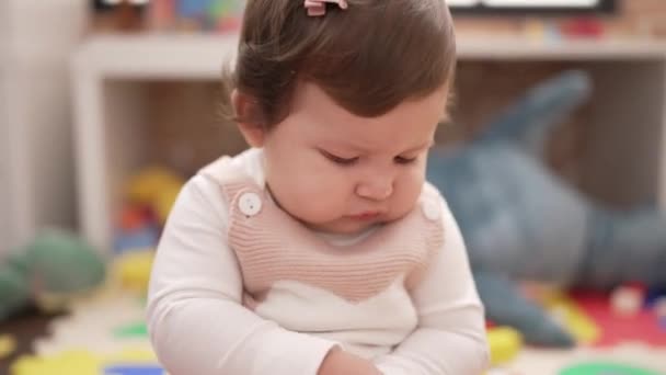 Adorable Toddler Playing Toys Sitting Floor Kindergarten — стоковое видео
