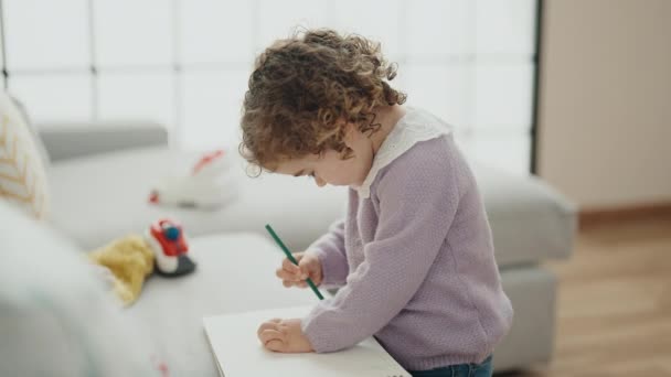 Adorable Hispanic Girl Drawing Notebook Standing Home — Video Stock