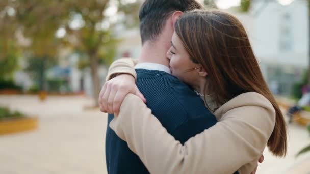 Young Couple Smiling Confident Hugging Each Other Standing Park — Video Stock